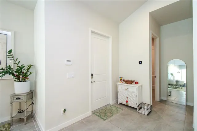 a view of room with entryway and dining area