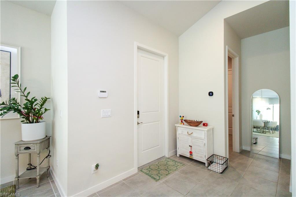 14803 Loggerhead Drive Naples, FL 34120 - Photo 20 of 50 a view of room with entryway and dining area