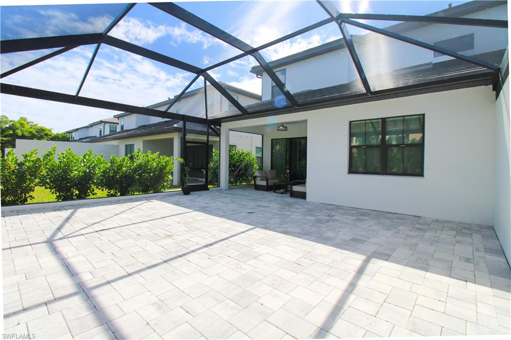 14803 Loggerhead Drive Naples, FL 34120 - Photo 9 of 50 a view of a room with a patio