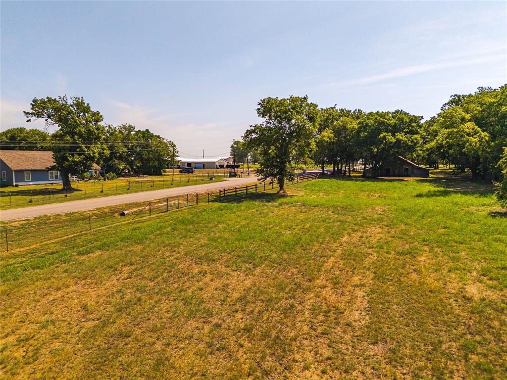 9574 County Road 502 Blue Ridge, TX 75424 - Photo 25 of 33 a view of a swimming pool and an outdoor seating