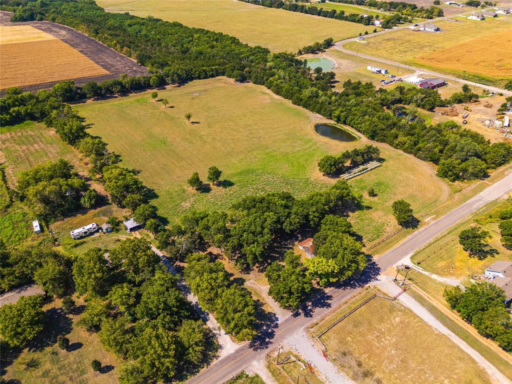 9574 County Road 502 Blue Ridge, TX 75424 - Photo 4 of 33 an aerial view of ocean residential house with swimming pool