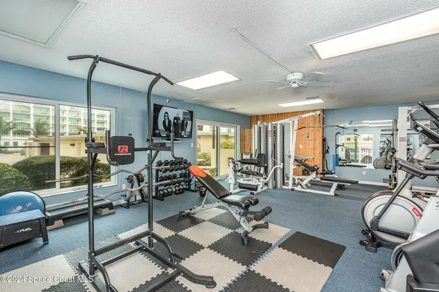 a view of a room with gym equipment