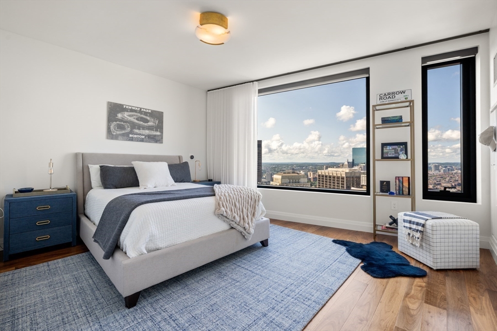 110 Sudbury Street, Unit 4002 Boston, MA 02114 - Photo 23 of 42 a bedroom with a bed and window