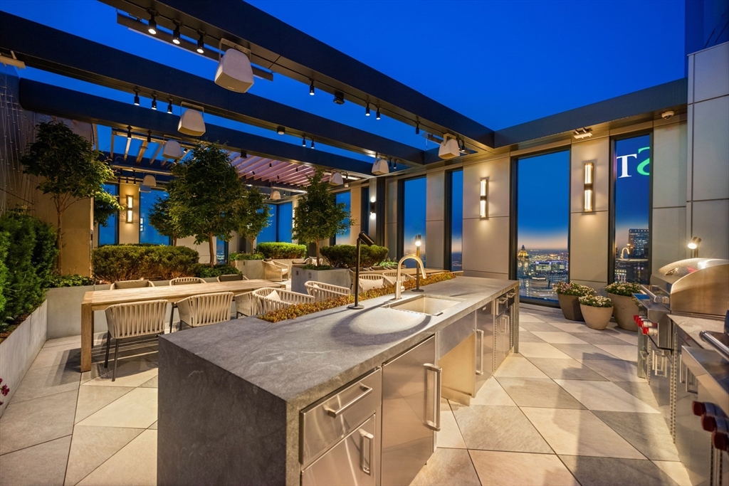 110 Sudbury Street, Unit 4002 Boston, MA 02114 - Photo 26 of 42 a view of a swimming pool with outdoor seating