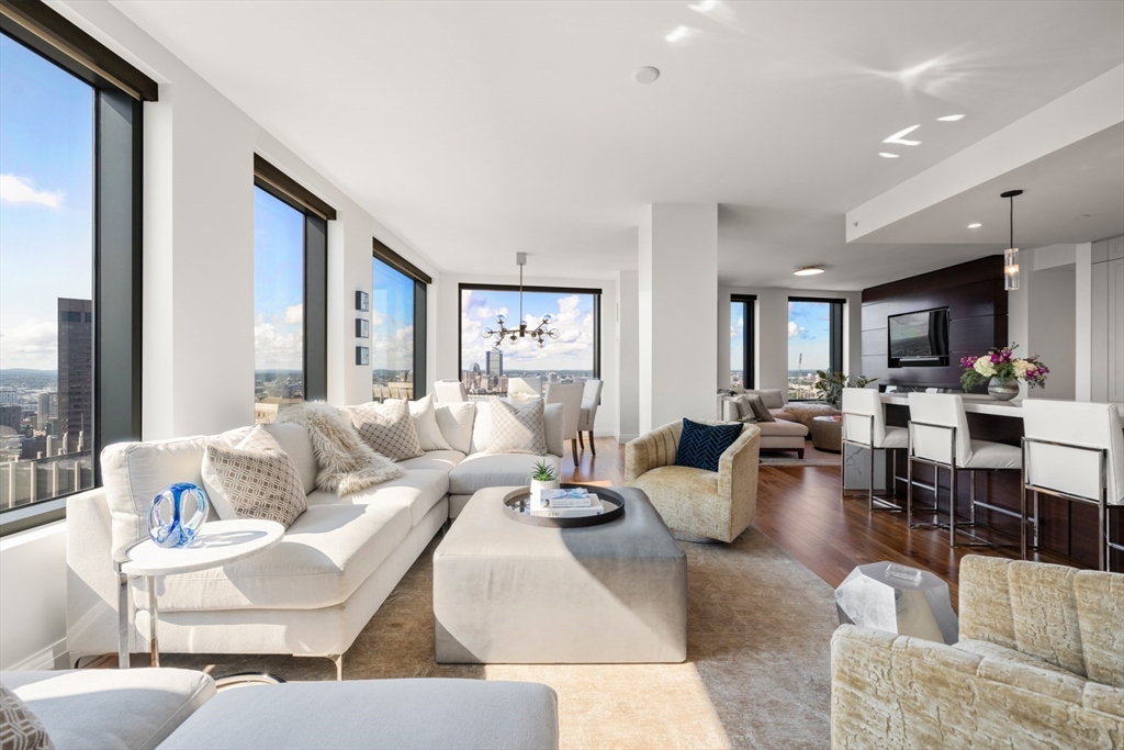 110 Sudbury Street, Unit 4002 Boston, MA 02114 - Photo 4 of 42 a living room with furniture kitchen view and a large window