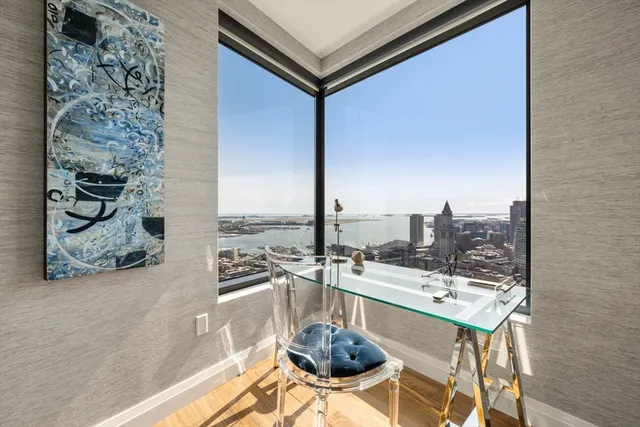 a kitchen with a table chairs and a stove