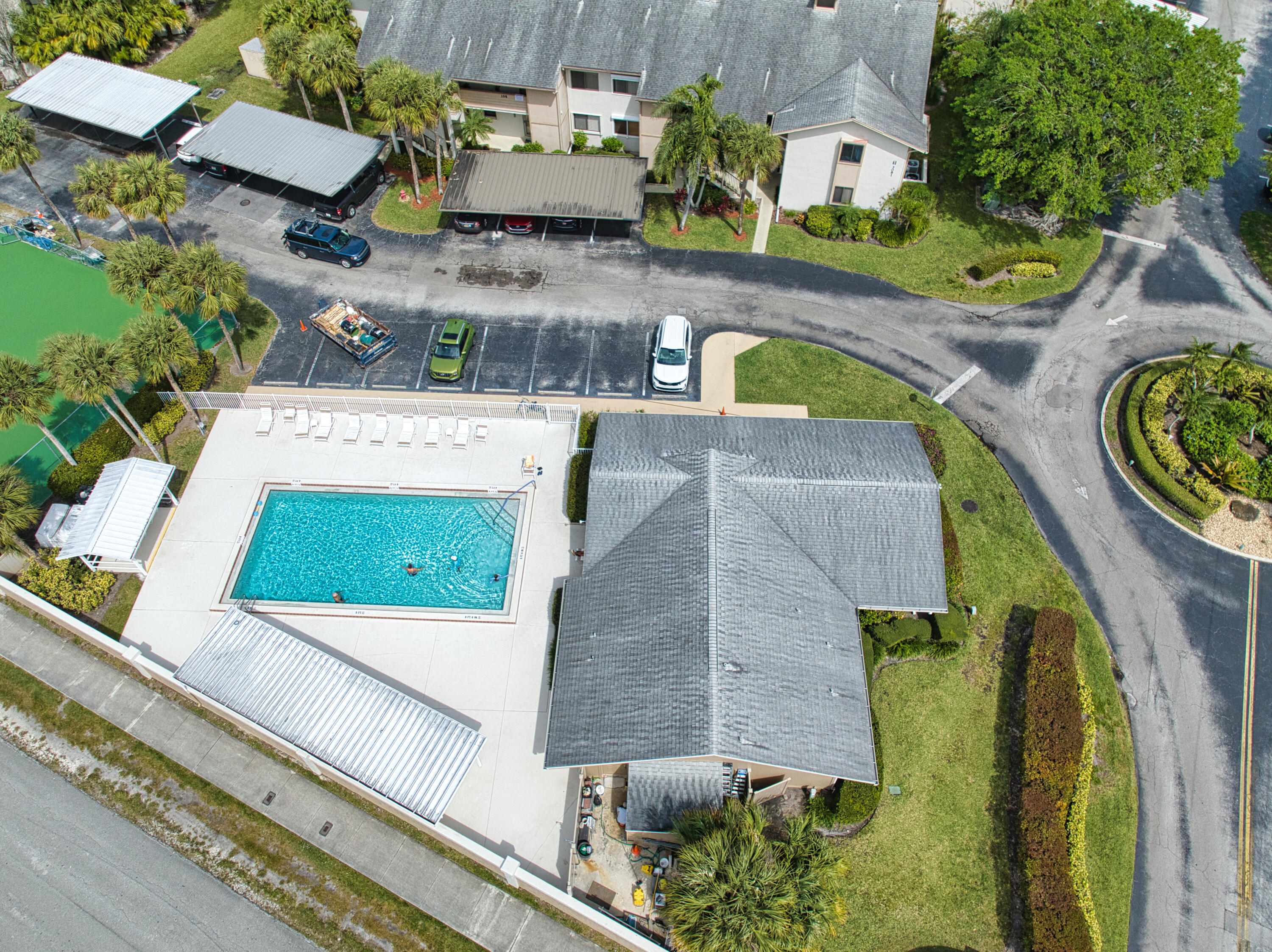3151 Southeast Aster Lane, Unit 1306 Stuart, FL 34994 - Photo 2 of 27 an aerial view of a house with a swimming pool