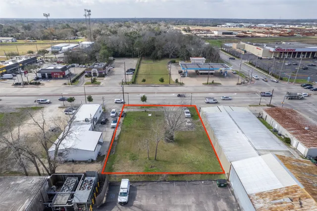 a view of swimming pool with a yard and lake view