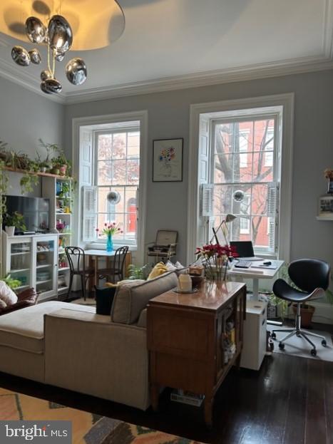 277 South 4th Street, Unit 1F Philadelphia, PA 19106 - Photo 2 of 12 a living room with furniture a flat screen tv and a window
