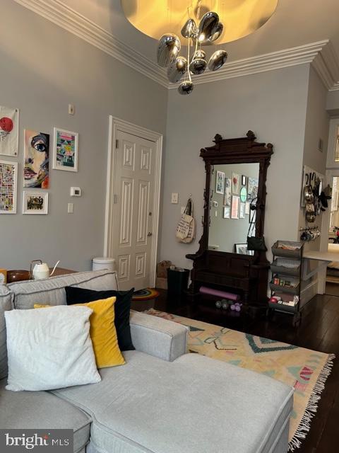 277 South 4th Street, Unit 1F Philadelphia, PA 19106 - Photo 5 of 12 a living room with furniture and a chandelier