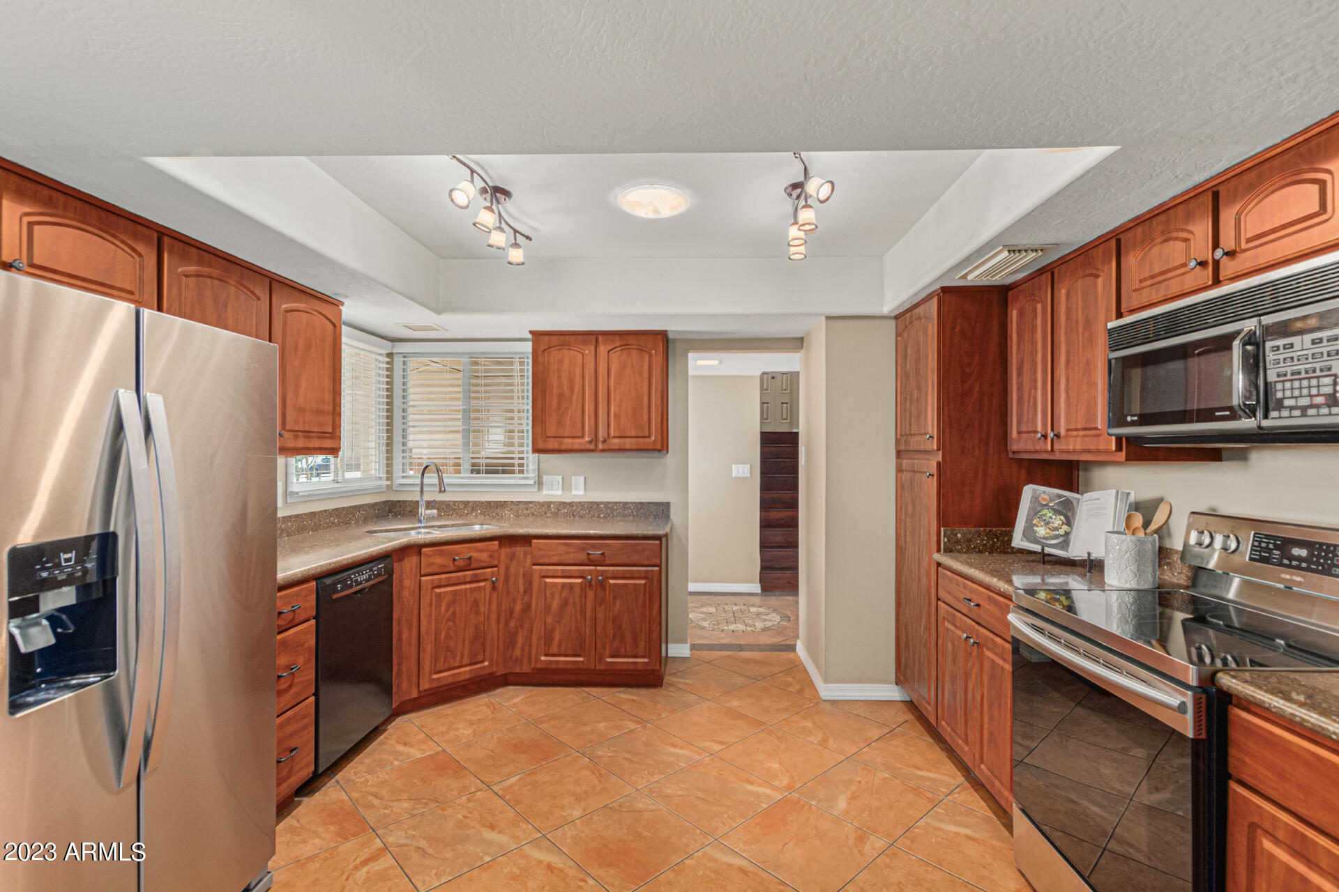 6740 South Terrace Road Tempe, AZ 85283 - Photo 19 of 43 Kitchen with Stainless Steel Appliances