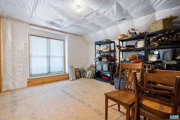 a view of a room with racks on the wall