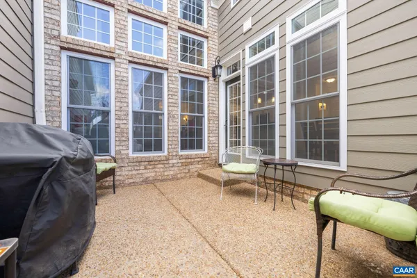 a view of a building with outdoor seating
