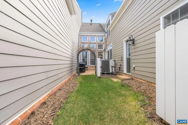 a house view with a backyard space