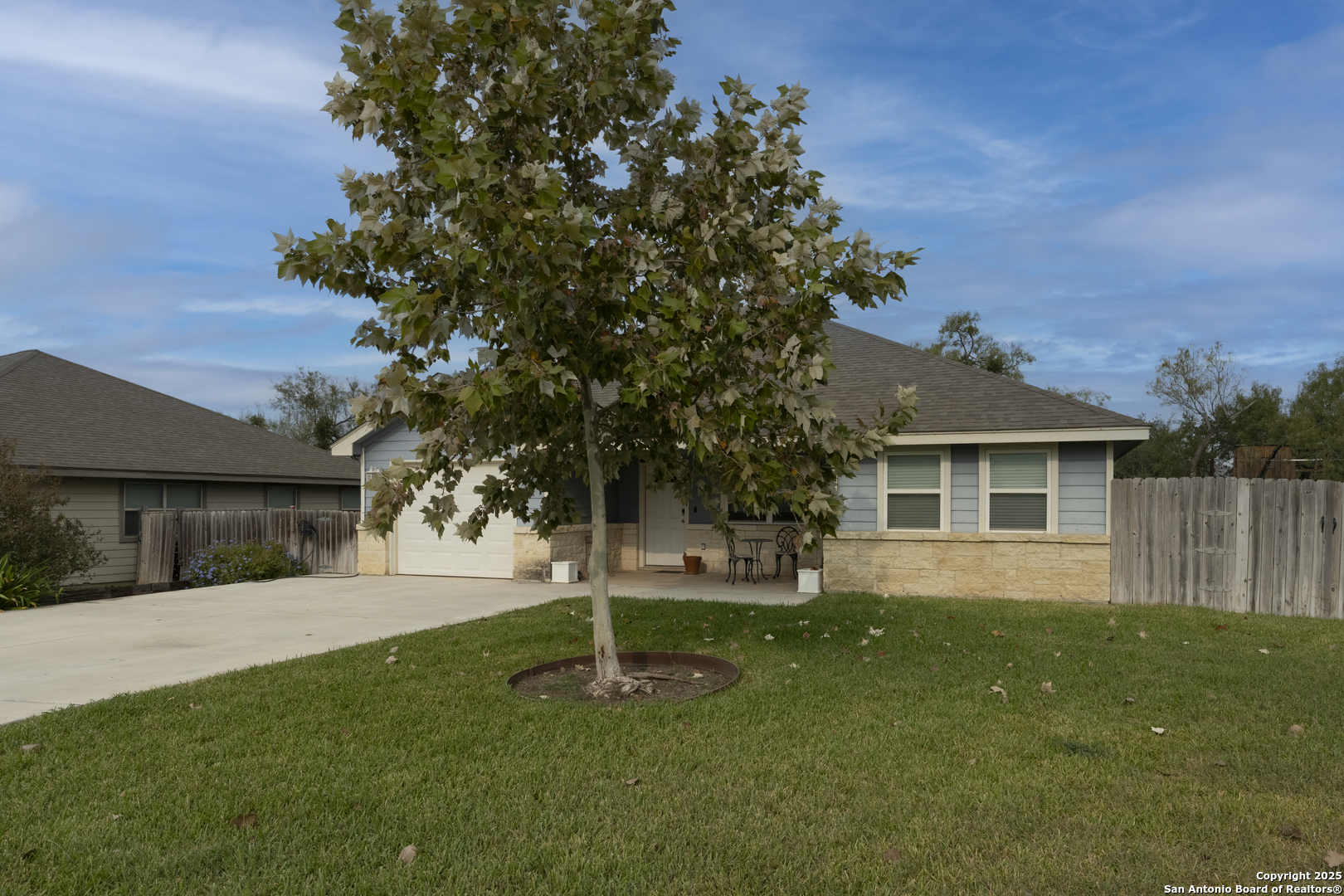 533 Indian Jourdanton, TX 78026 - Photo 2 of 27 a front view of house with yard and green space