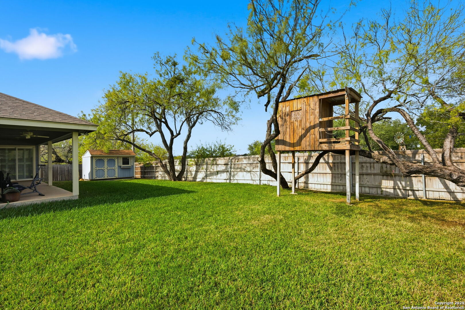 533 Indian Jourdanton, TX 78026 - Photo 27 of 27 a garden with trees in front of it