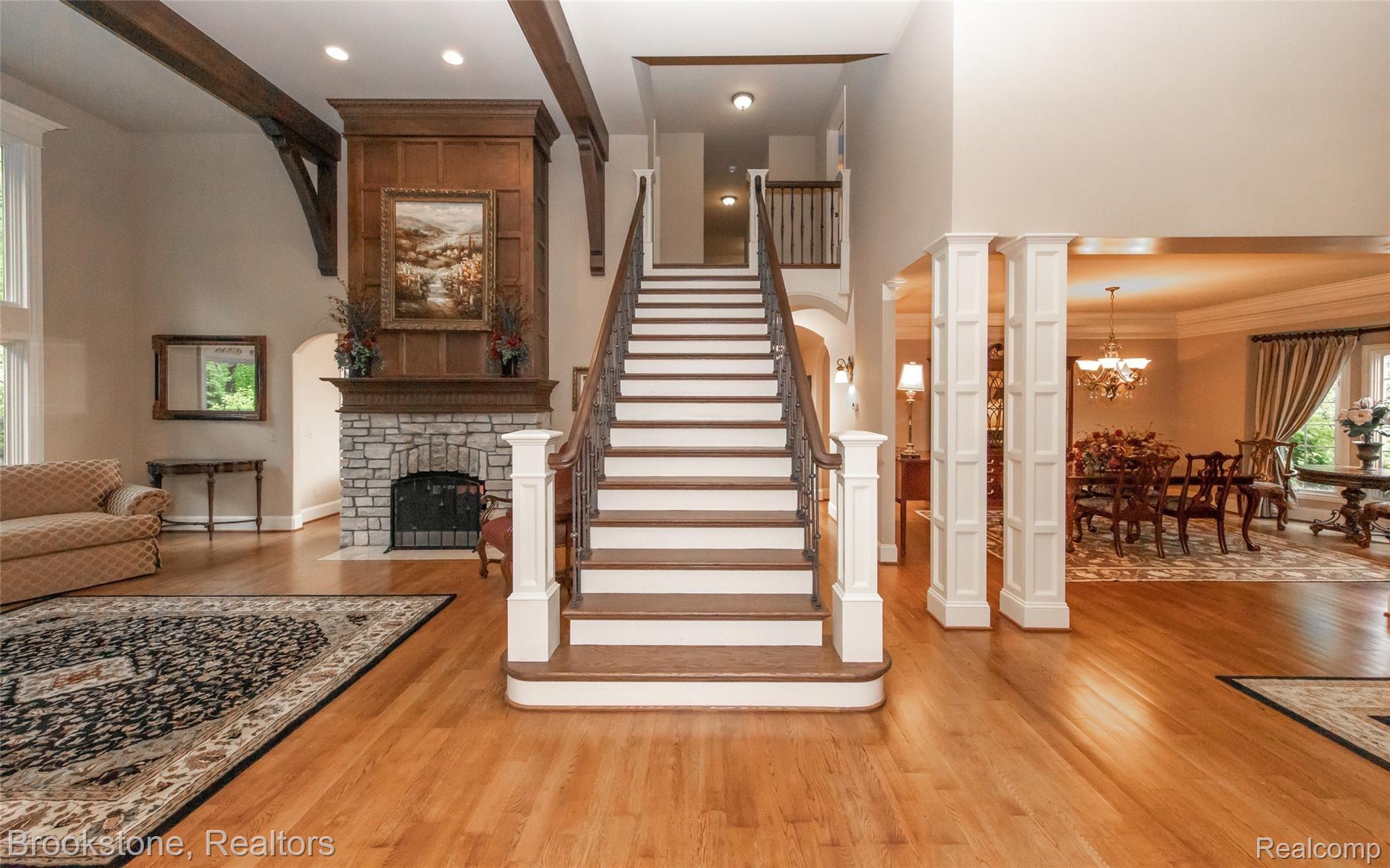 7868 Holcomb Road Clarkston, MI 48348 - Photo 37 of 60 Grand Staircase leads to Upper Level with 4 Bedrooms