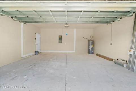 a view of a kitchen with a dishwasher and a refrigerator