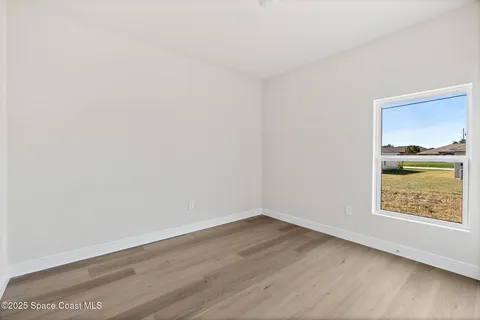 a house with trees in the background