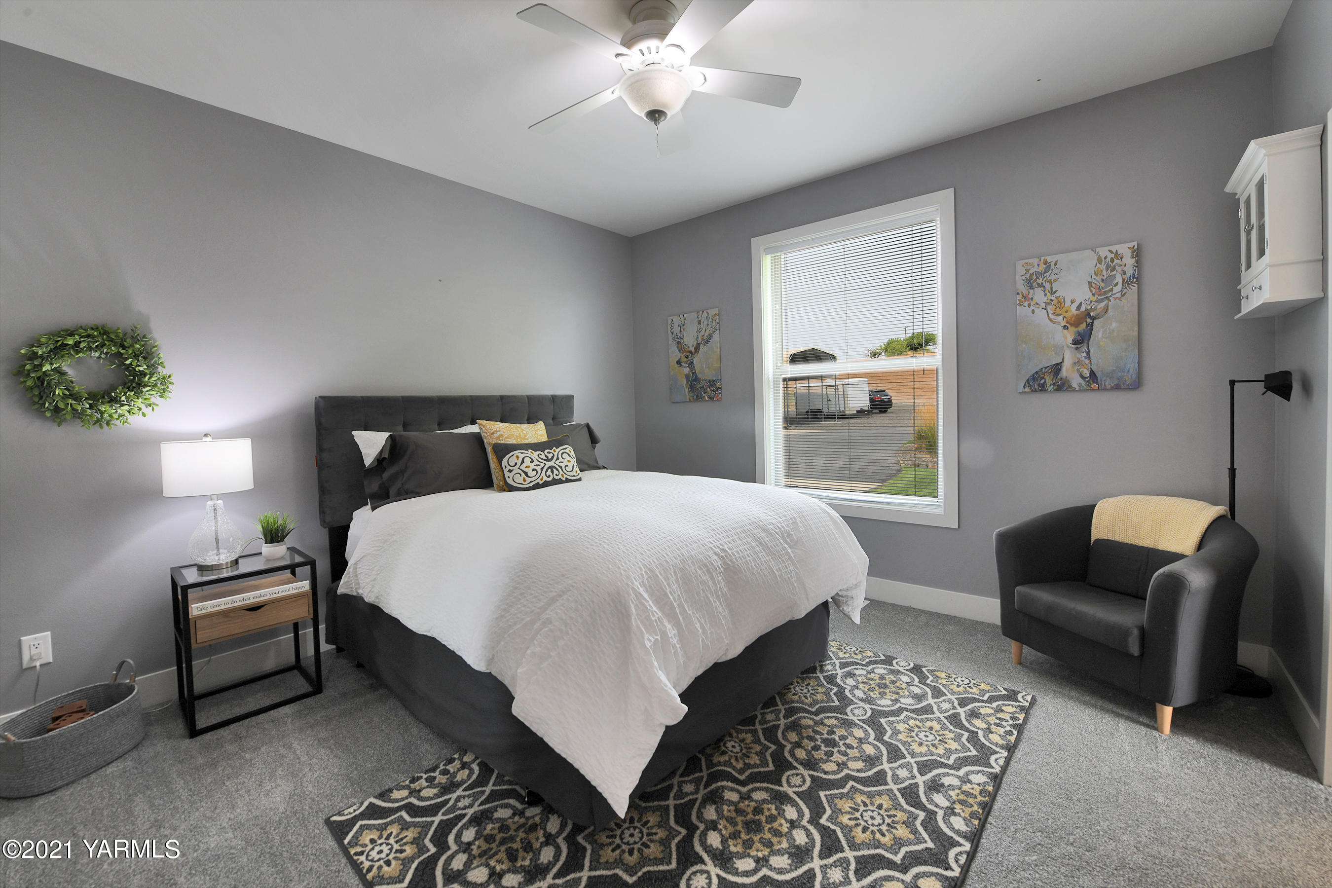 478 Pomona Heights Road Yakima, WA 98901 - Photo 25 of 60 a bedroom with a bed a couch and dresser