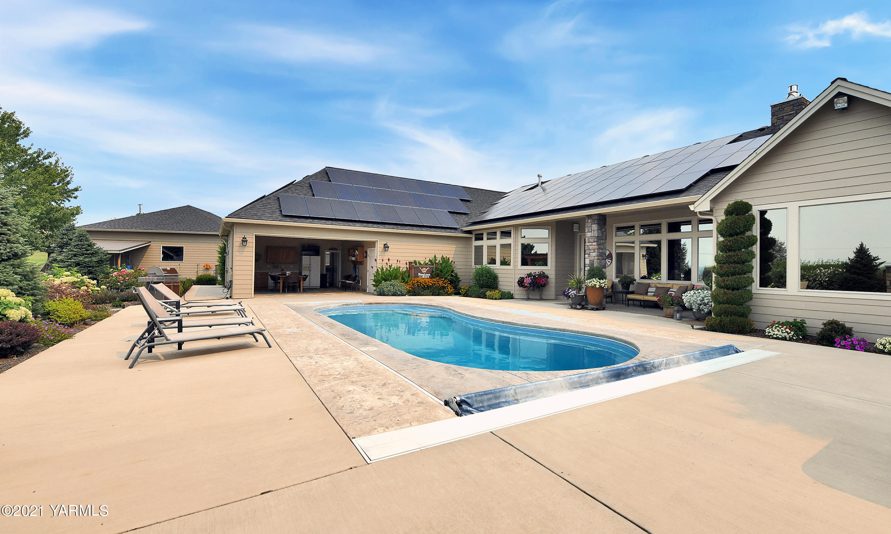 478 Pomona Heights Road Yakima, WA 98901 - Photo 41 of 60 a view of house with swimming pool and sitting area