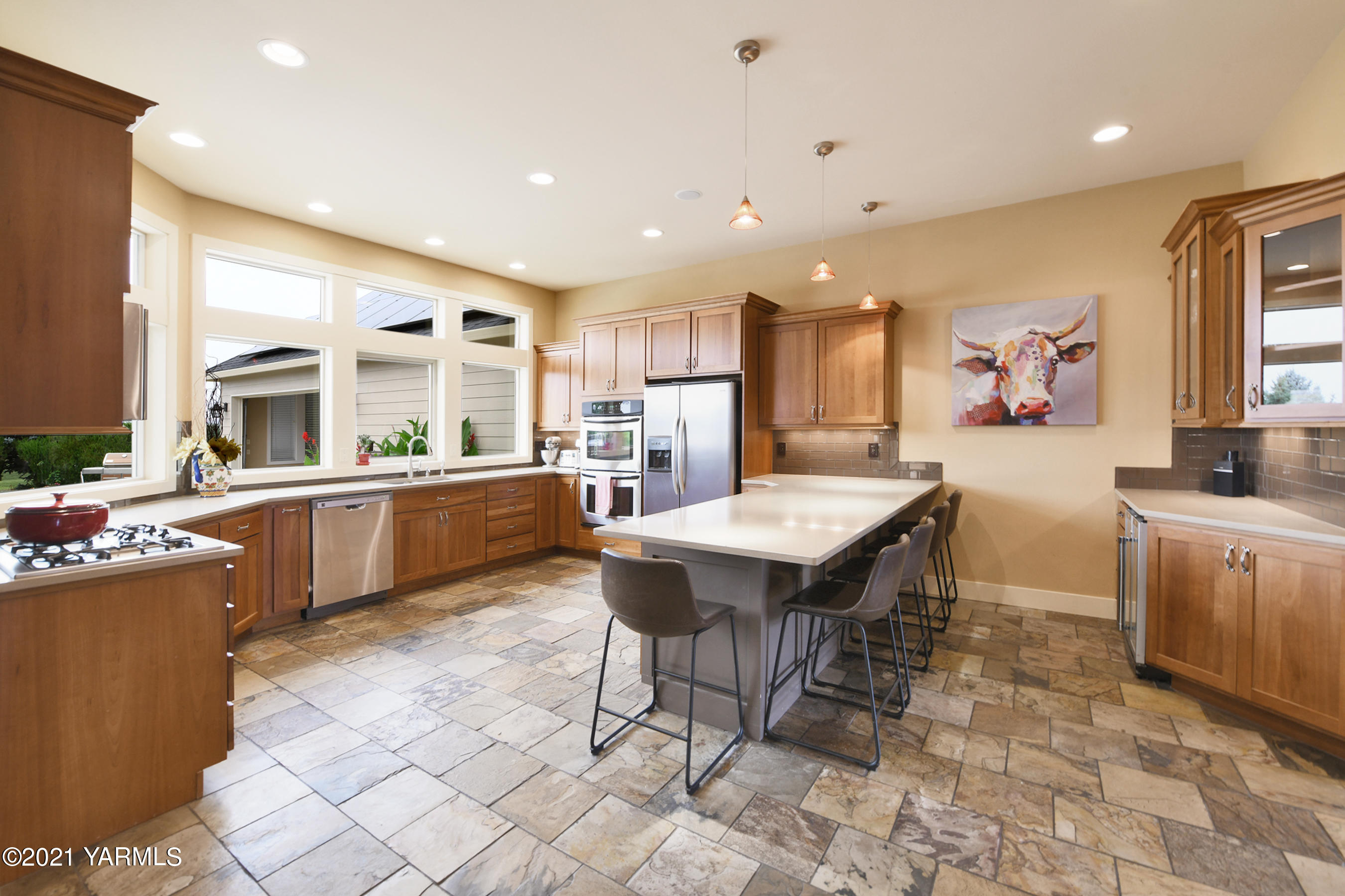 478 Pomona Heights Road Yakima, WA 98901 - Photo 8 of 60 a kitchen with stainless steel appliances kitchen island granite countertop a sink and cabinets