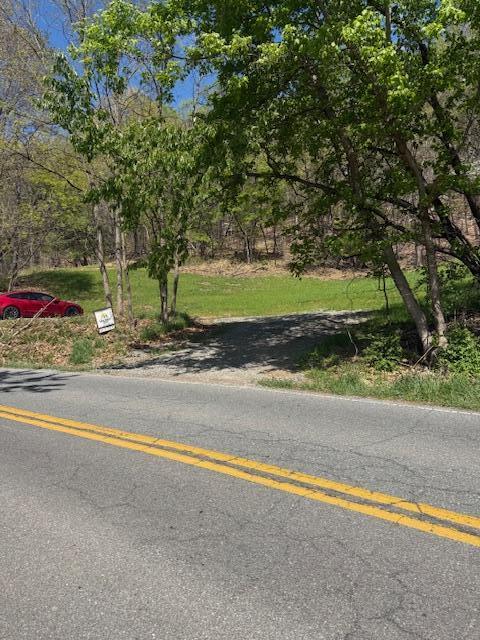 0 Sugar Loaf Mountain Road Roanoke, VA 24018 - Photo 3 of 35 a view of a house with a yard and basketball court