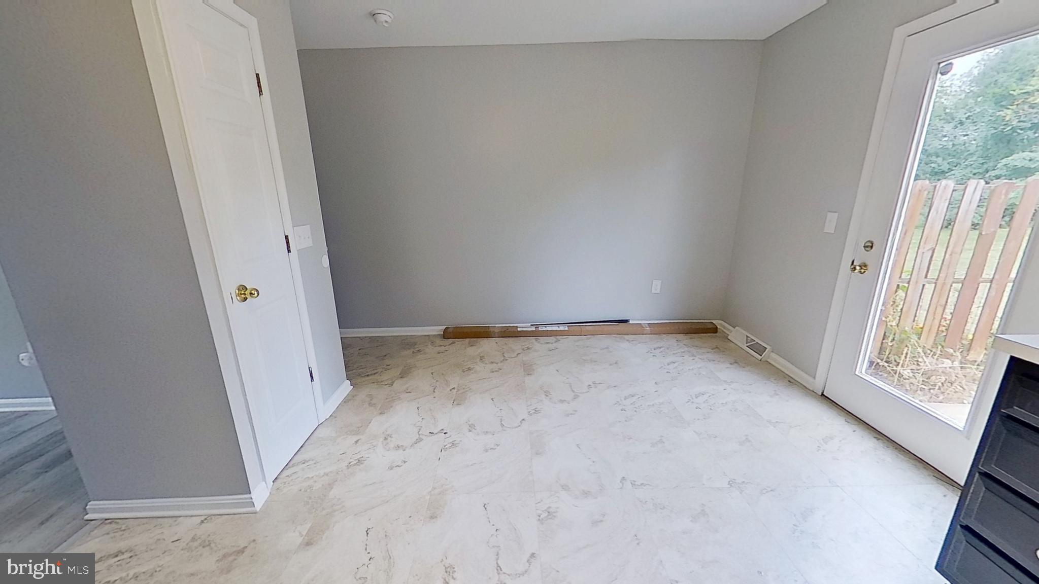 231 Olney Road Dallastown, PA 17313 - Photo 4 of 8 an empty room with windows