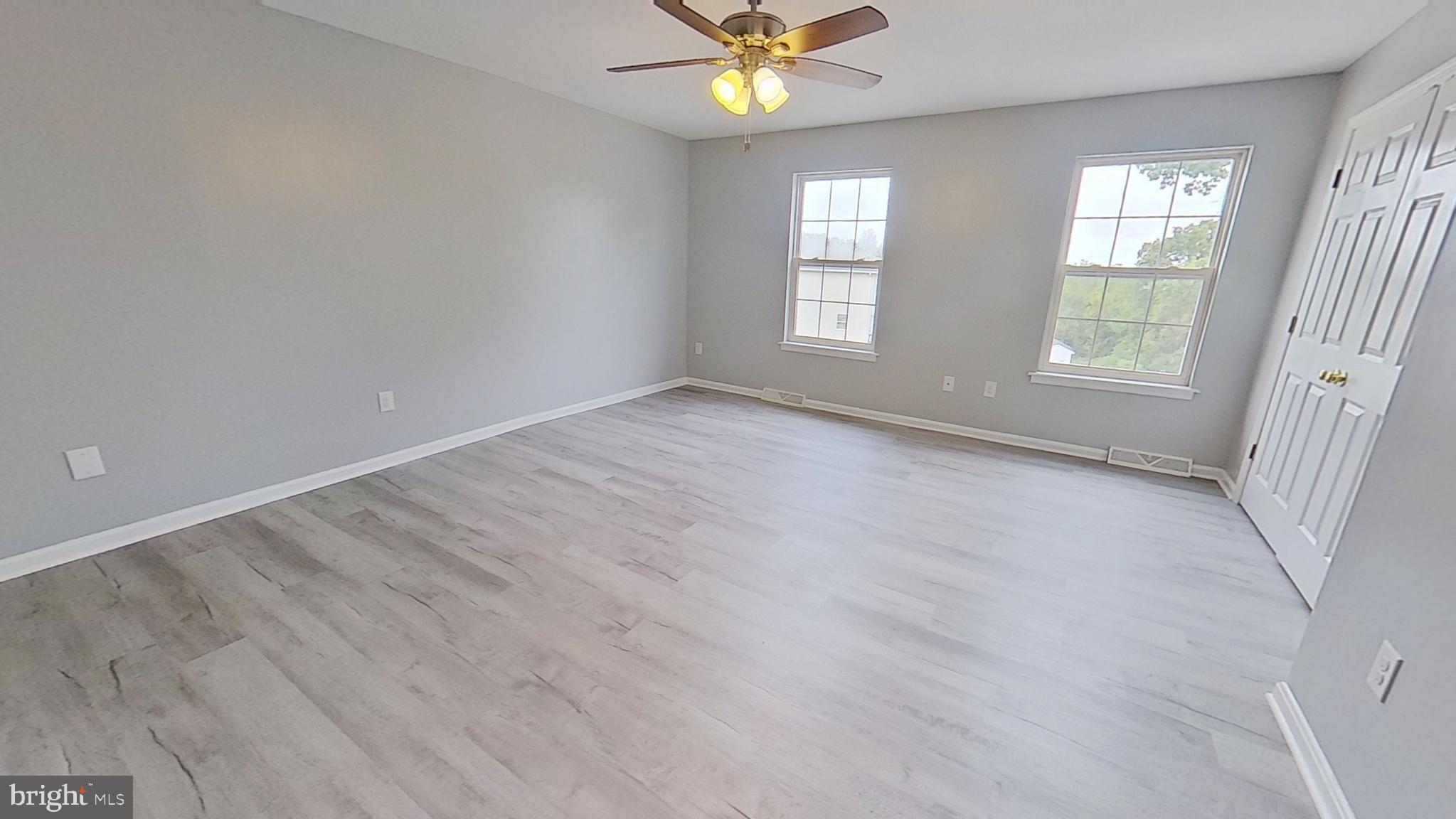 231 Olney Road Dallastown, PA 17313 - Photo 8 of 8 wooden floor in an empty room with a window