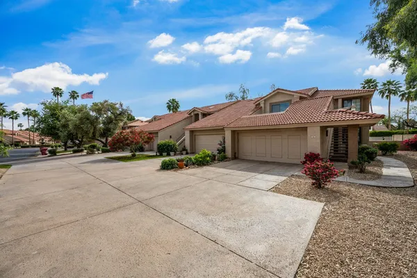 front view of a house with an outdoor space
