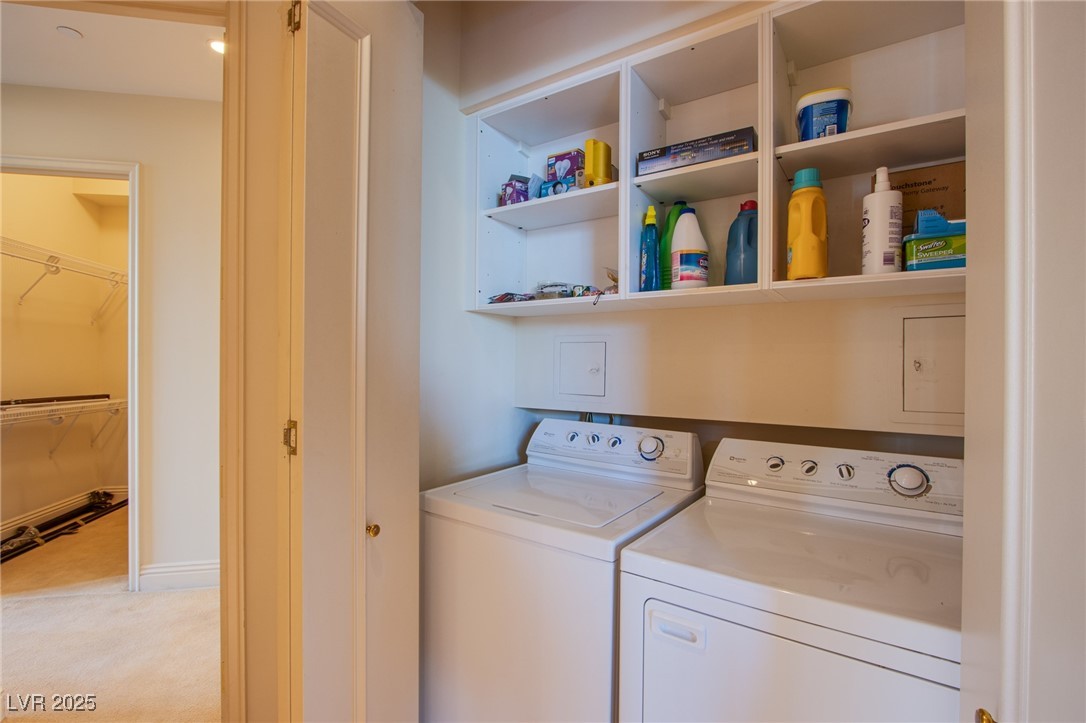 2857 Paradise Road, Unit 206 Las Vegas, NV 89109 - Photo 26 of 31 Laundry room with light colored carpet and separate washer and dryer