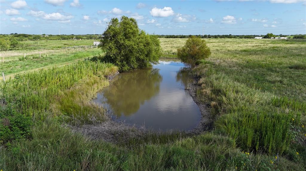 Lot 25 Northwest County 2170 Road Barry, TX 75102 - Photo 2 of 39 a view of a lake with a yard