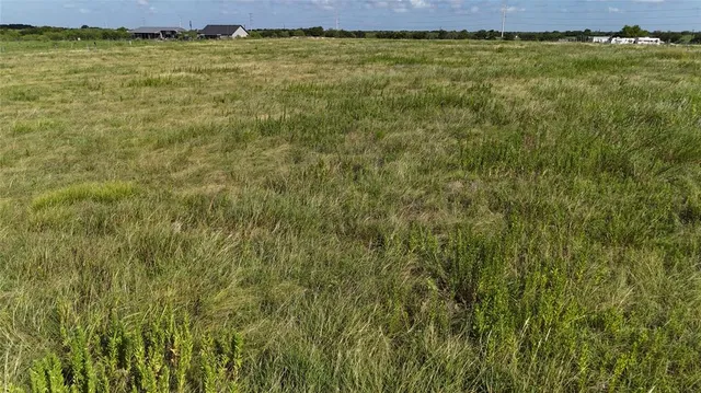 a view of a yard with an outdoor space