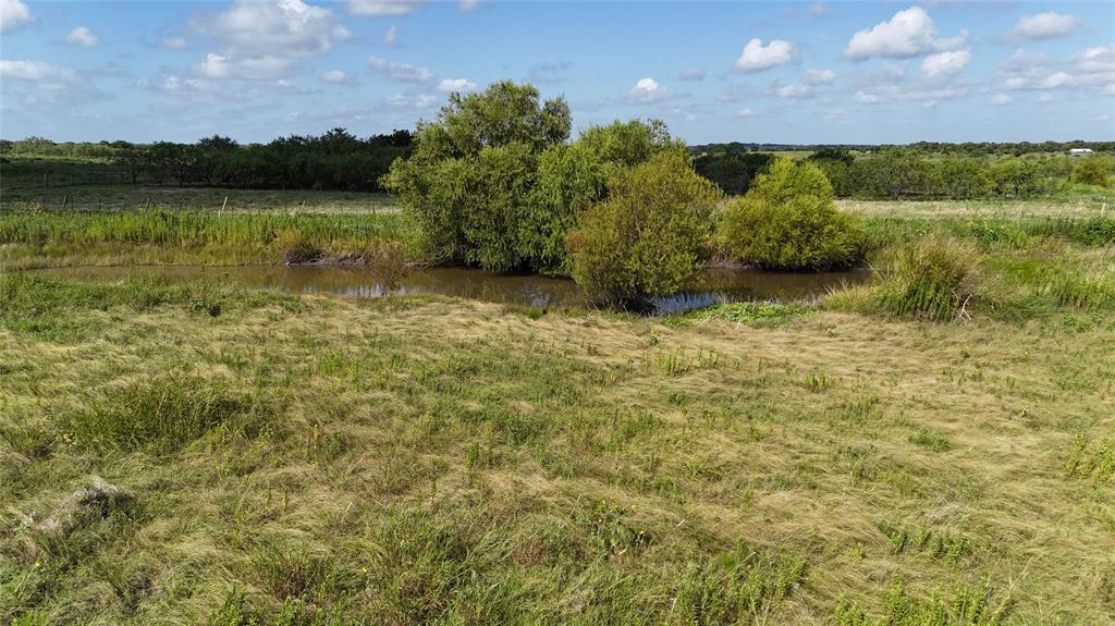 Lot 25 Northwest County 2170 Road Barry, TX 75102 - Photo 37 of 39 a view of a lake with houses in the back