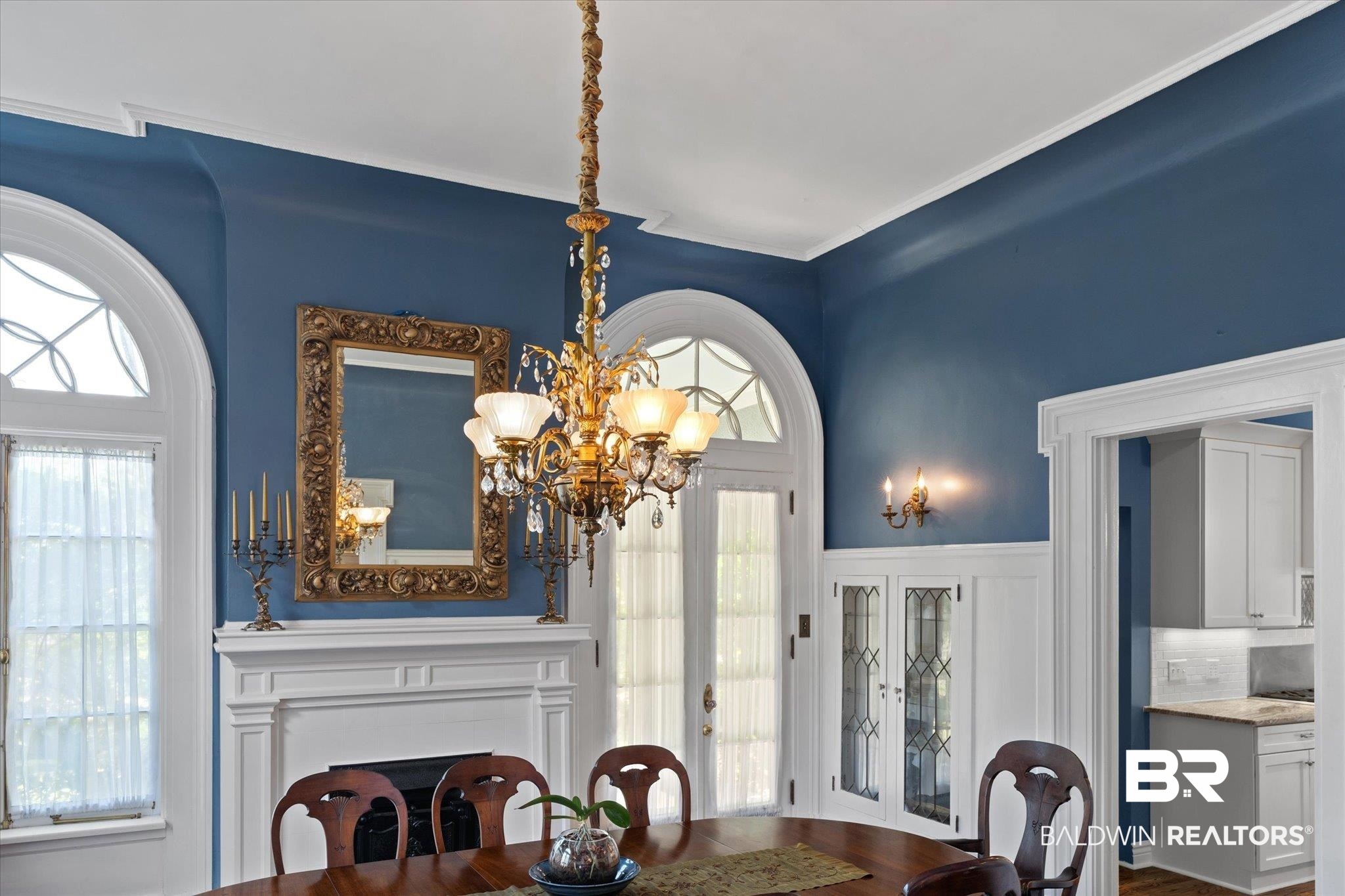 1953 Dauphin Street Mobile, AL 36606 - Photo 8 of 56 Dining room with wood-type flooring and a chandelier