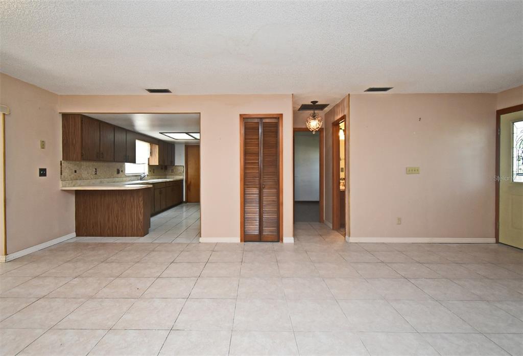 741 Arlene Drive Deltona, FL 32725 - Photo 13 of 34 a view of a kitchen with a sink and cabinets