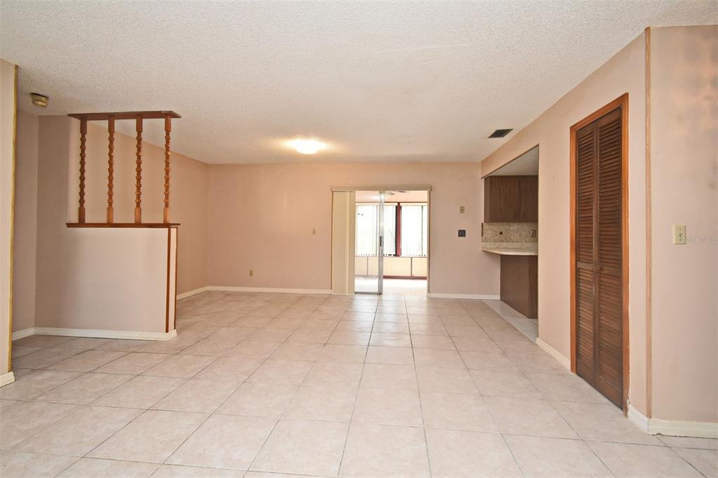 741 Arlene Drive Deltona, FL 32725 - Photo 14 of 34 a view of a kitchen with a refrigerator a dishwasher and a refrigerator