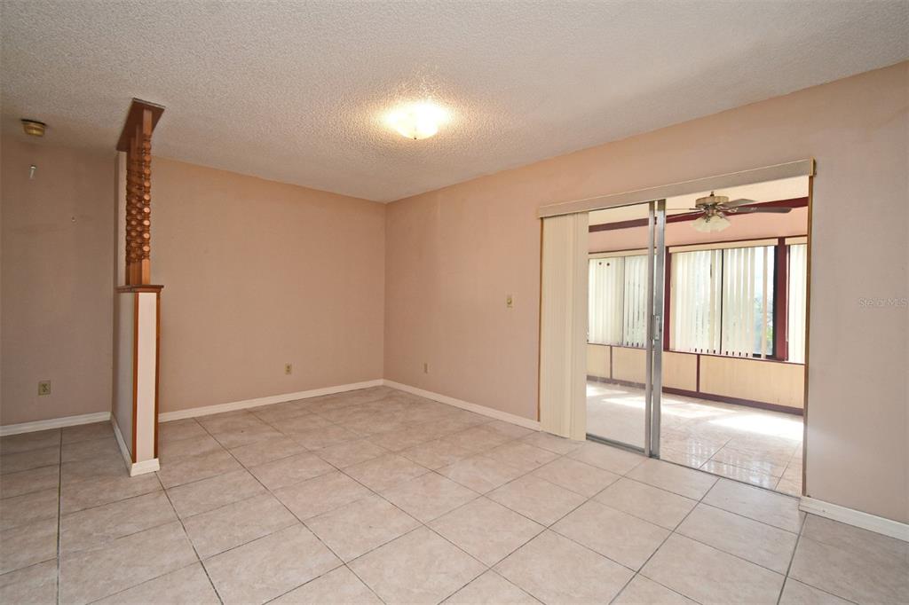 741 Arlene Drive Deltona, FL 32725 - Photo 15 of 34 a view of an empty room and window