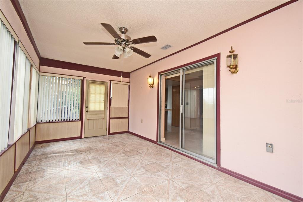 741 Arlene Drive Deltona, FL 32725 - Photo 21 of 34 a view of an empty room with a window