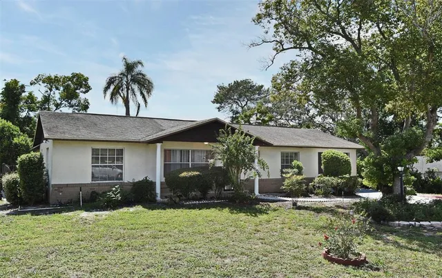 front view of a house with a yard