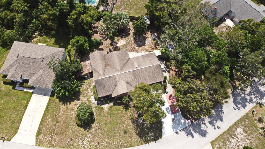 741 Arlene Drive Deltona, FL 32725 - Photo 5 of 34 an aerial view of a house with a yard