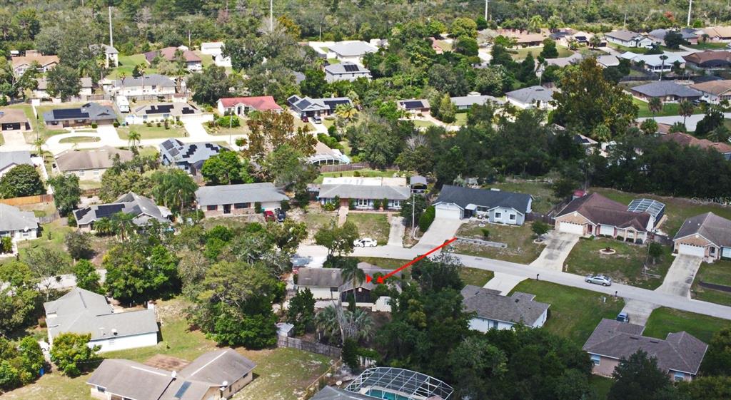 741 Arlene Drive Deltona, FL 32725 - Photo 7 of 34 an aerial view of a houses with yard