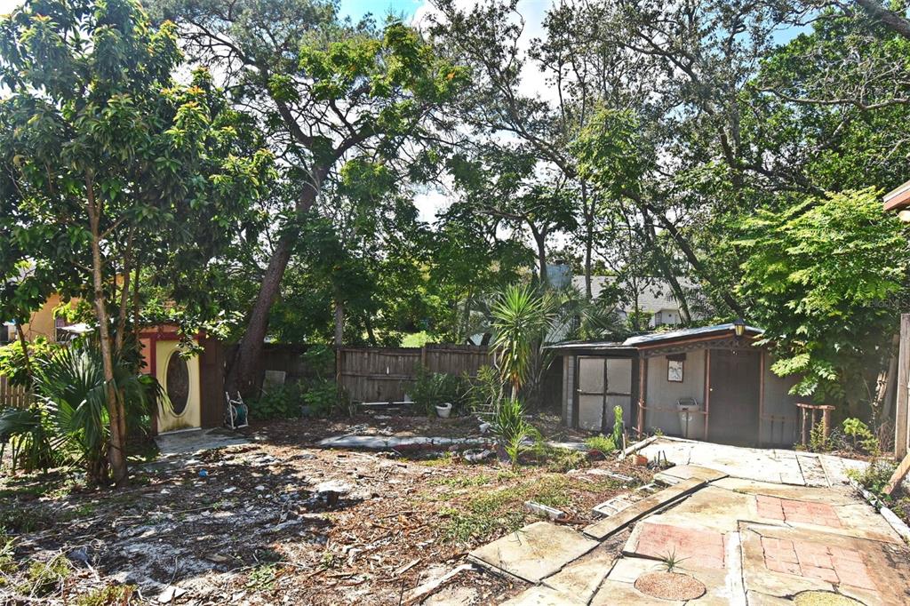 741 Arlene Drive Deltona, FL 32725 - Photo 8 of 34 a tree in front of a house