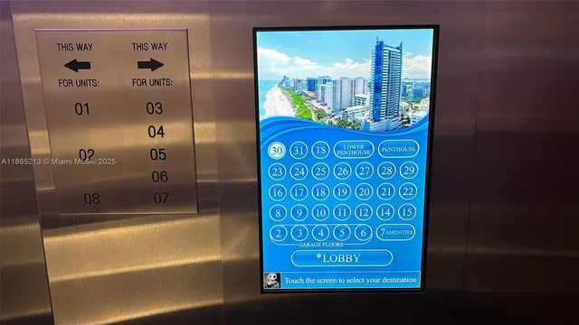 a hallway with cabinets and two wooden floors