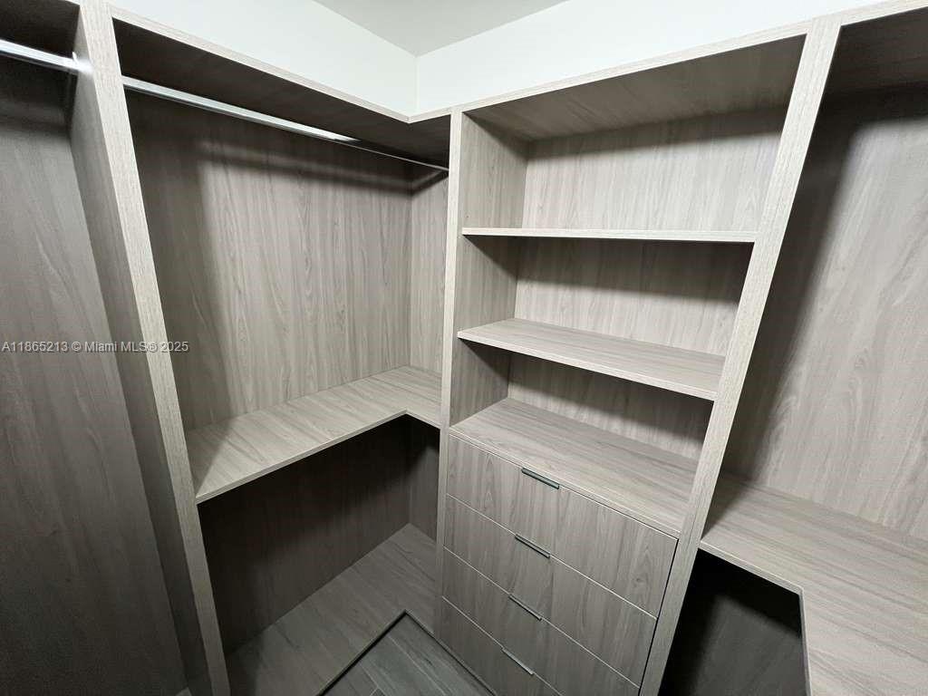 6301 Collins Avenue, Unit 3002 Miami Beach, FL 33141 - Photo 27 of 27 a utility room with dryer and washer