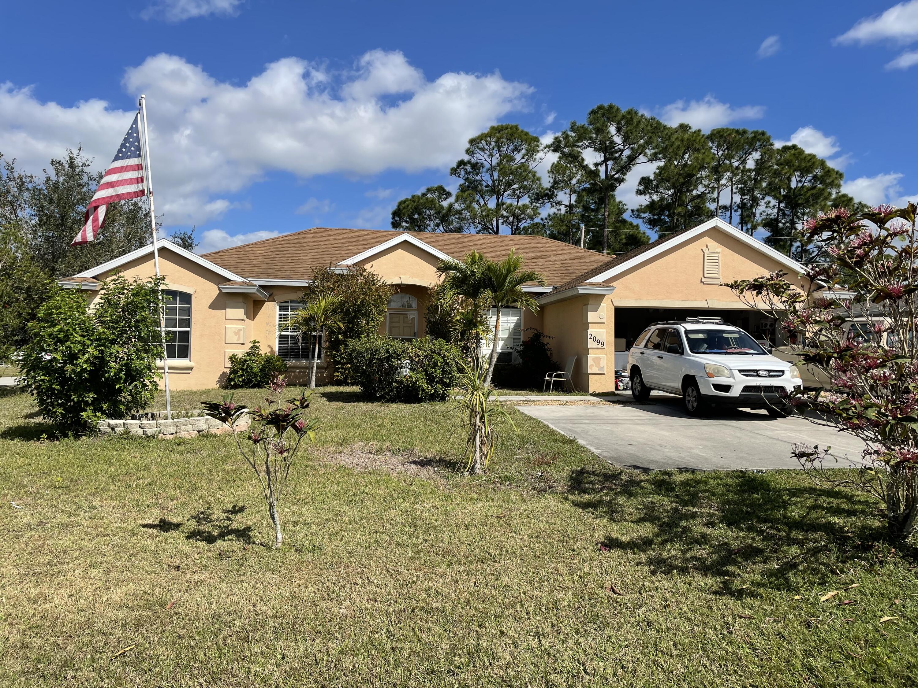 2099 Southwest Del Rio Boulevard Port St. Lucie, FL 34953 - Photo 1 of 21 Front pic 1