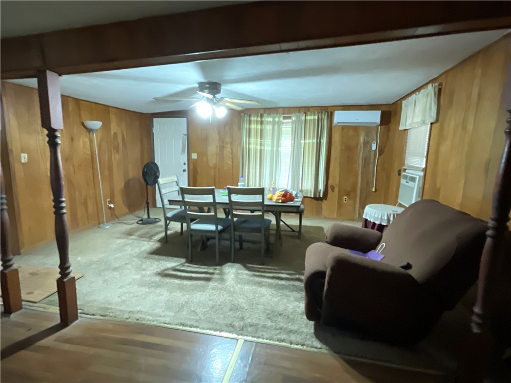 3128 Hackberry Street Ingleside, TX 78362 - Photo 8 of 11 a living room with furniture and a large window