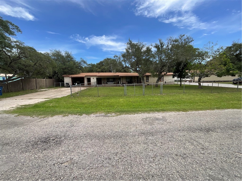 3128 Hackberry Street Ingleside, TX 78362 - Photo 10 of 11 a view of a house with a yard