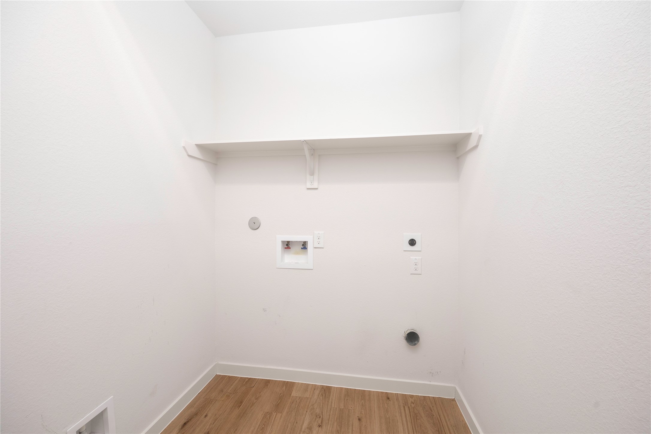 2517 Appian Way, Unit B Roman Forest, TX 77357 - Photo 14 of 31 a view of small space with racks on the wall