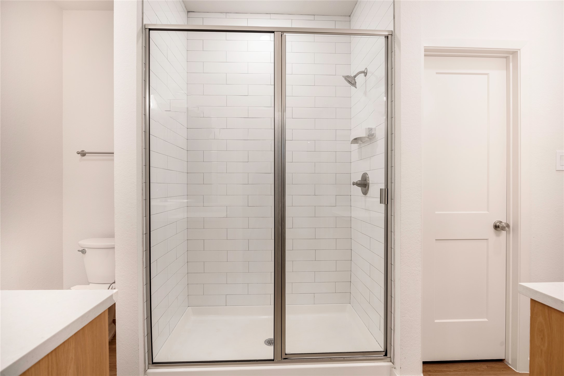 2517 Appian Way, Unit B Roman Forest, TX 77357 - Photo 18 of 31 a bathroom with a shower and a sink